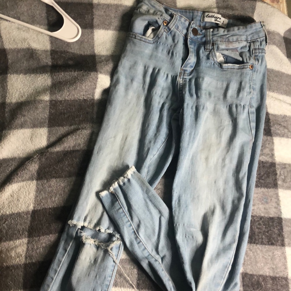 Ripped Knee Jeans